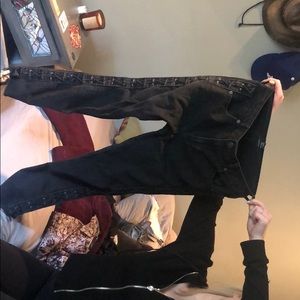 Black jeans with ties up the side